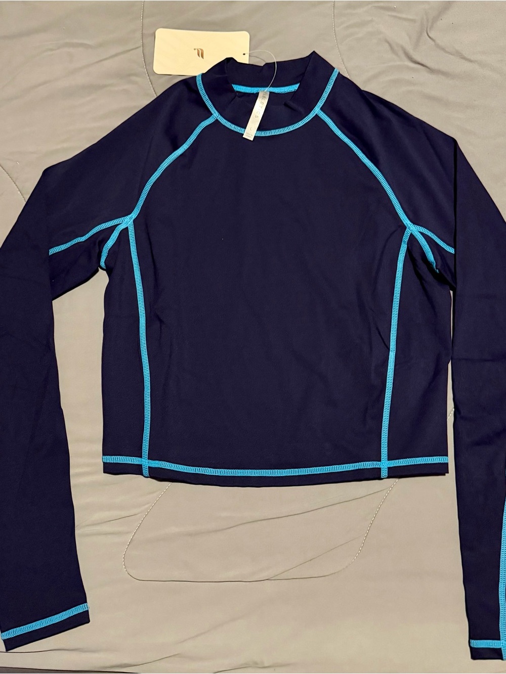 Women’s Long-Sleeve Navy Rash Guard with Aqua Trim